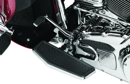 Kuryakyn Hex Driver Floorboards for Harley-Davidson Touring and Softail motorcycles, featuring durable metal construction and mounting hardware.