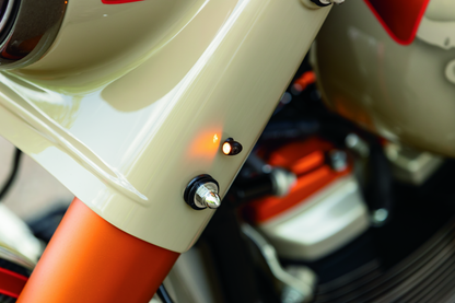 Kuryakyn Kellermann Atto clear lens amber LED motorcycle indicator lights in satin black finish.