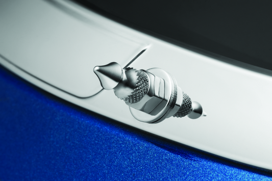 Kuryakyn Chrome Windshield Mounting Spikes for 14-Up FL Touring Models, mounted on motorcycle windshield.