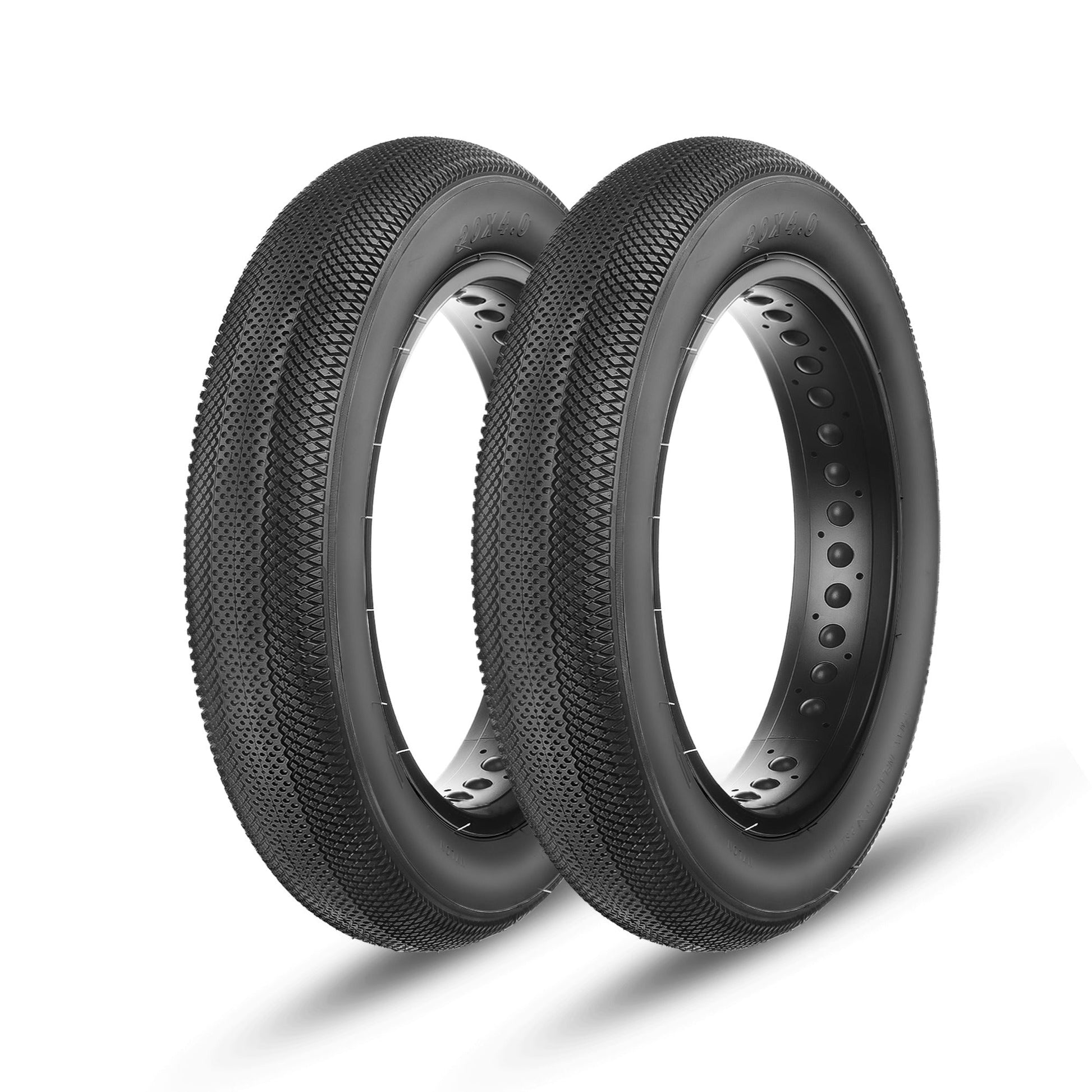 Two black Hycline HyperPave electric bike and fat bike tires, 4-inch wide, designed for off-road and fat tire e-bikes.