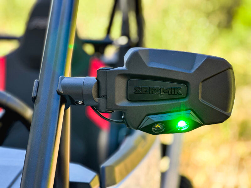 Seizmik Pursuit UTV sideview mirror with green LED illumination and adjustable ROP clamp, white frame, for enhanced nighttime visibility.