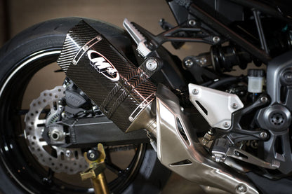 Carbon fiber slip-on exhaust for Kawasaki Z900 2017-2025, stylish design, from Bill's Exhausts, with detailed close-up view.