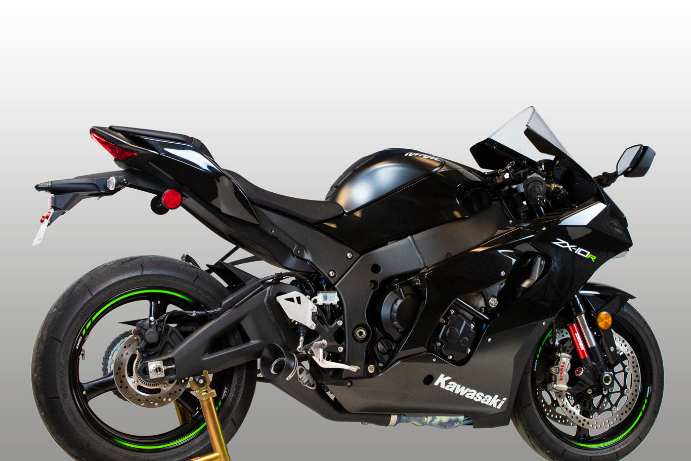 Black Bill's Exhausts M4 GP19 slip-on exhaust for Kawasaki ZX10R 2021-2025, shown at an angle with sleek design and branding.