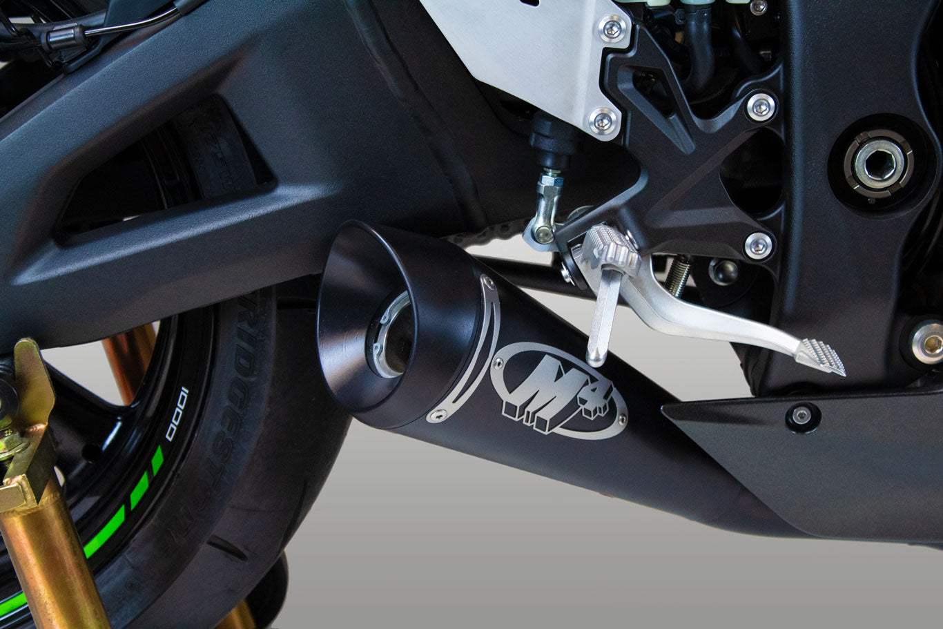 Black slip-on M4 exhaust for Kawasaki ZX10R 2021-2025 by Bill's Exhausts, shown close-up view of the exhaust system.