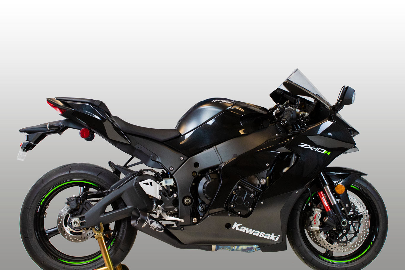 Black slip-on M4 GP19 exhaust for Kawasaki ZX10R 2021-2026 by Bill's Exhausts, shown from side view.