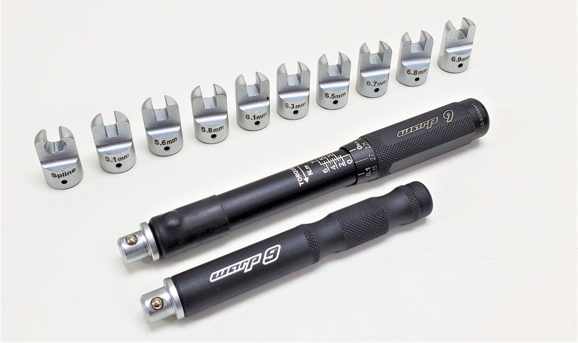 Warp9Racing Spoke Torque Wrench Kit for bike spokes, compact tool for precise tightening and adjustments.