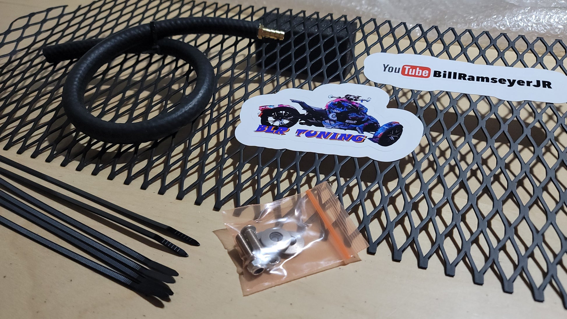 RYKER BLACK RADIATOR GRILL AND FUEL OVERFLOW EXTENSION HOSE - Howling Moto