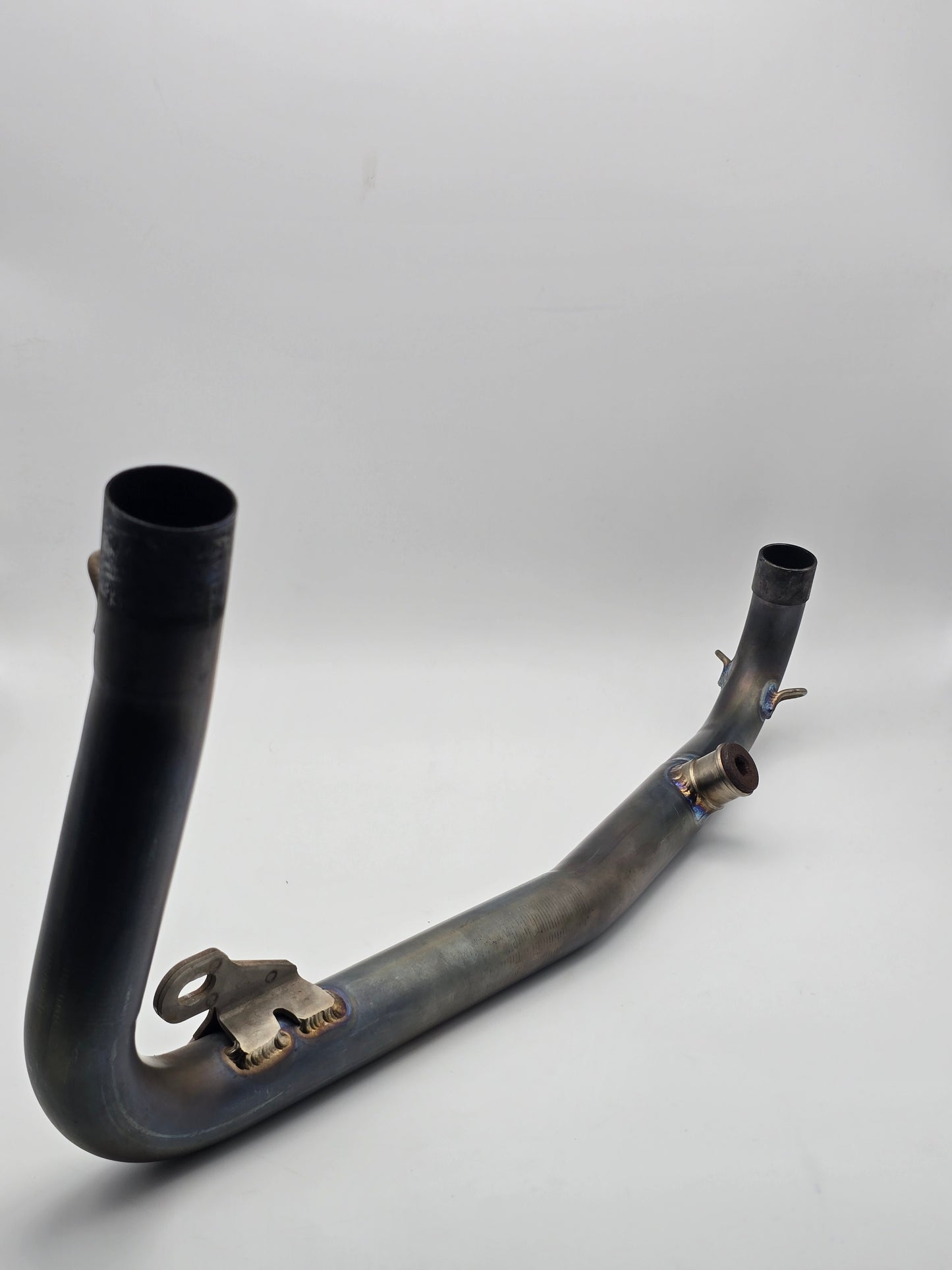 Yoshimura RS-9T titanium full motorcycle exhaust system installed on Honda Grom 2014-2020 model.