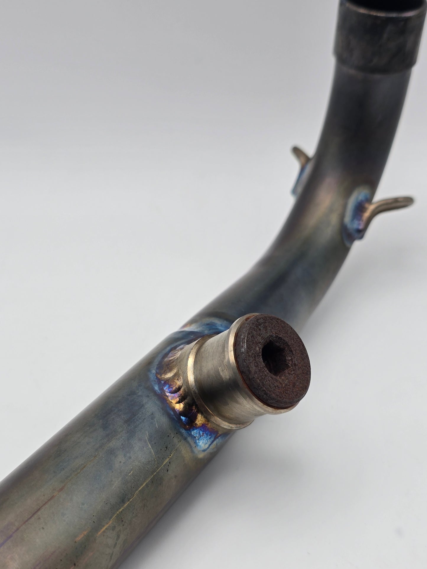 Used Yoshimura RS-9T titanium motorcycle exhaust system for Honda Grom 2014-2020, showing the full exhaust with titanium finish.