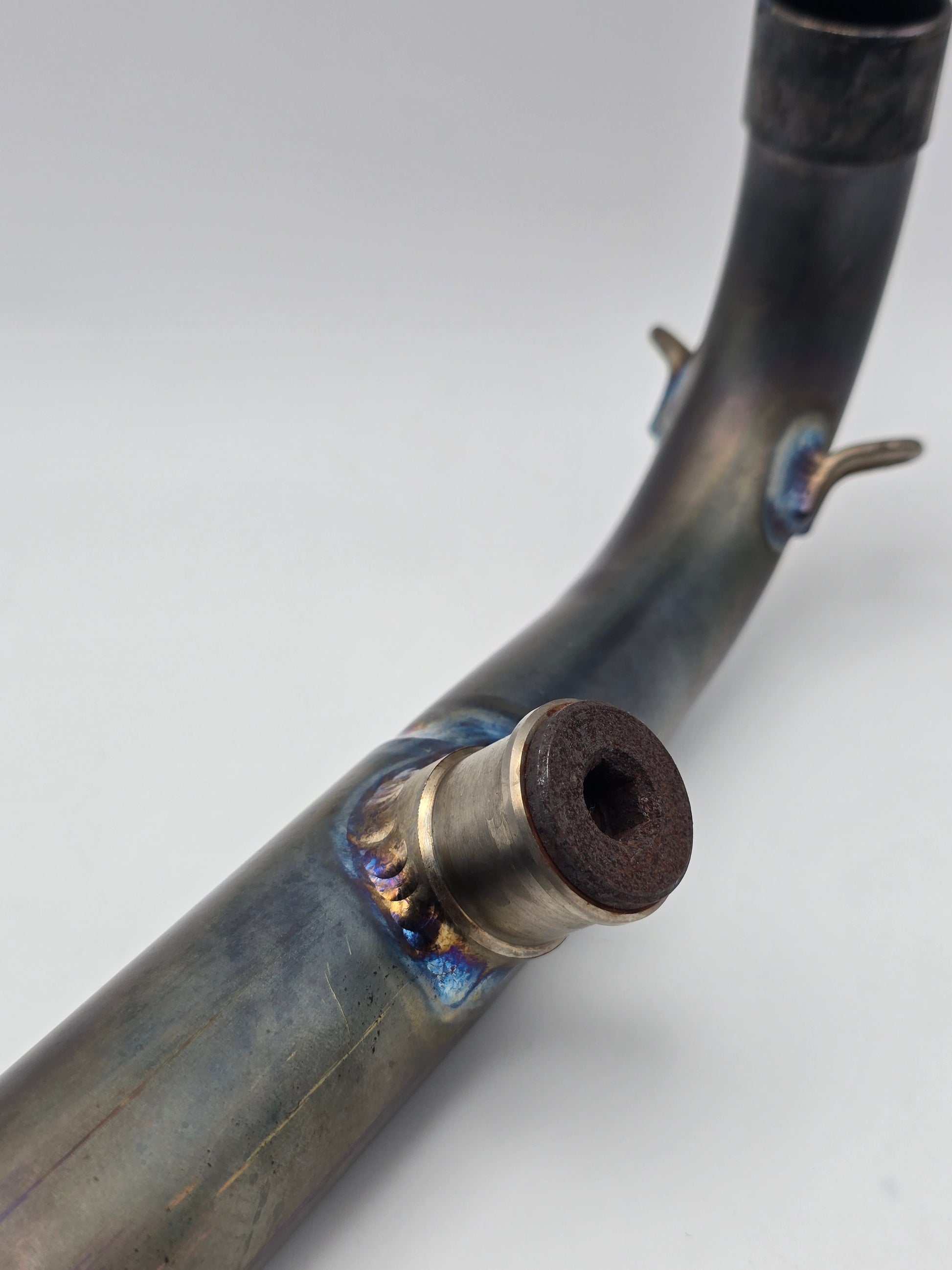 Used Yoshimura RS-9T titanium motorcycle exhaust system for Honda Grom 2014-2020, showing the full exhaust with titanium finish.