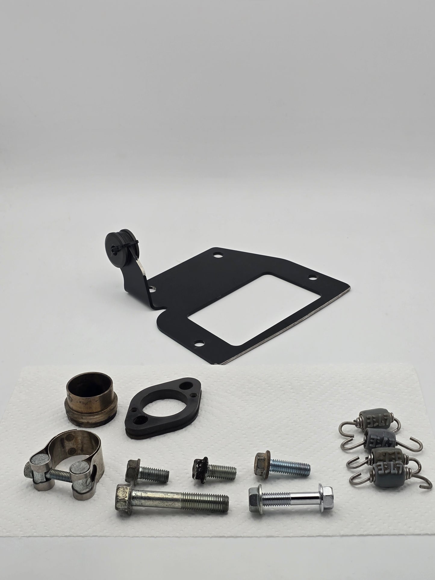 Used Yoshimura RS-9T titanium motorcycle exhaust system for Honda Grom 2014-2020, shown installed on the bike.