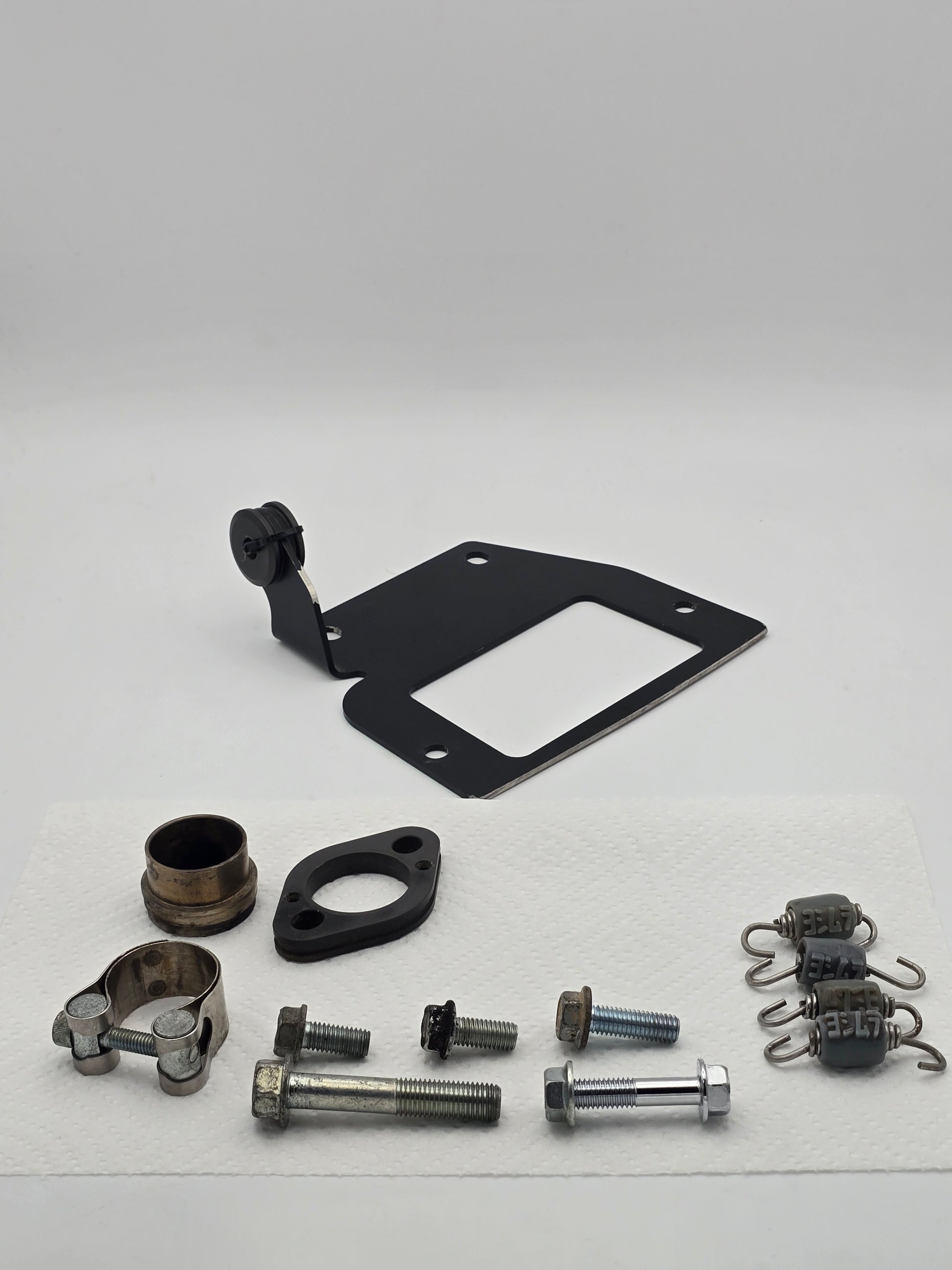 Used Yoshimura RS-9T titanium motorcycle exhaust system for Honda Grom 2014-2020, shown installed on the bike.