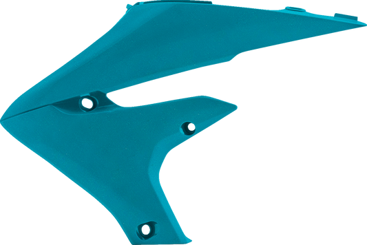 Acerbis teal radiator shrouds for motorcycles, mounted on the body, with detailed design and branding.