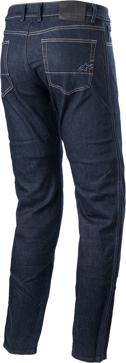 Alpinestars Sektor motorcycle pants in medium blue with reinforced panels and zipper closures, designed for riding comfort and safety.