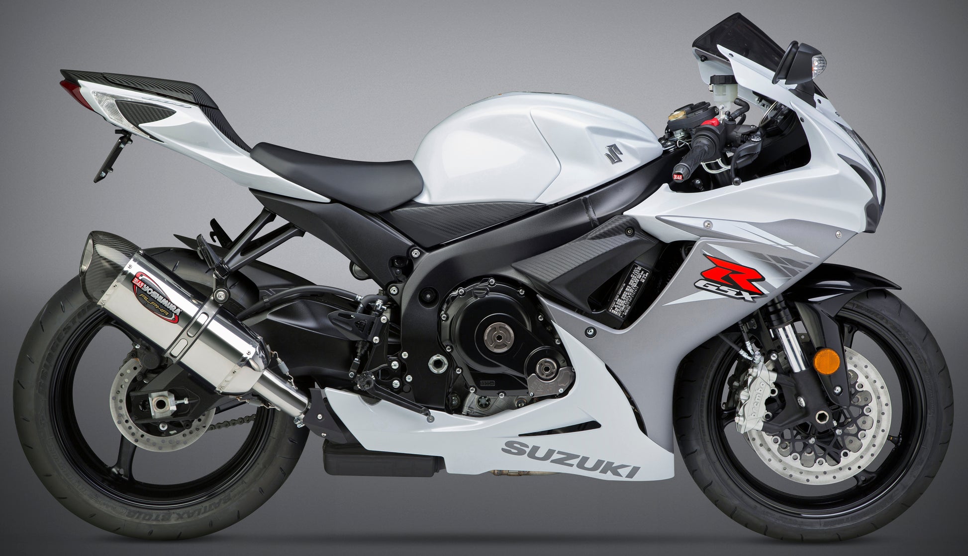 YOSHIMURA Signature Alpha Slip-On exhaust with stainless steel and carbon fiber end cap for motorcycle, part #11600EM520