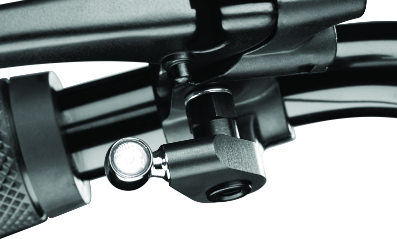Kuryakyn M6 internal threaded nut for Atto and Kellermann motorcycle lighting installation, shown in close-up image.