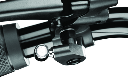 Kuryakyn M6 internal threaded nut for Atto and Kellermann motorcycle lighting installation, shown in close-up image.
