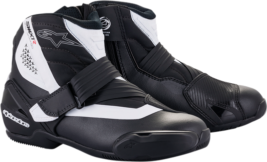 Alpinestars SMX-1 v2 motorcycle riding boots in black and white with ankle protection and durable leather construction.