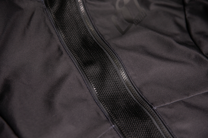 Black ICON Women's Airform™ Jacket displayed on a hanger, showcasing its lightweight, stylish design and sleek fit.