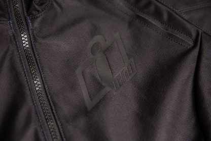 Black ICON Women's Airform™ Jacket, lightweight and stylish, shown on a model with front view and zipped closure.