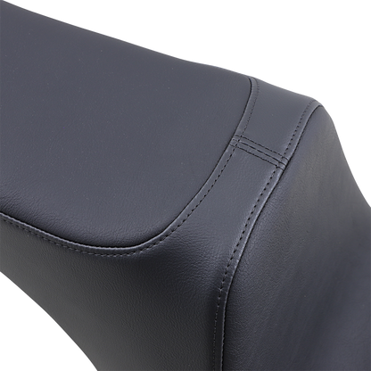 Black vinyl Drag Specialties Predator III 2-up seat for Harley Softail from 2006 to 2017, featuring a comfortable, stylish motorcycle seat.