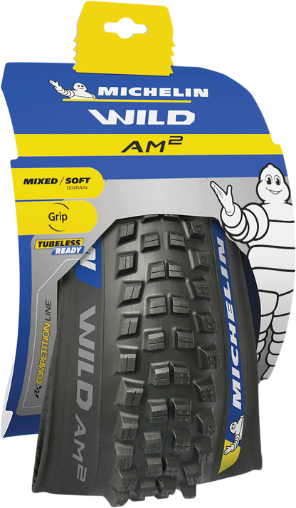 Michelin Wild AM2 mountain bike tire 27.5 x 2.60 with rugged tread for superior grip and durability on rough trails.