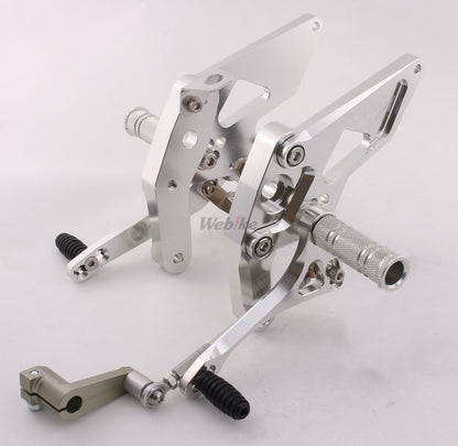 Over Racing Honda Grom rearsets with 4-position adjustable footpeg mounts, designed for enhanced riding performance.