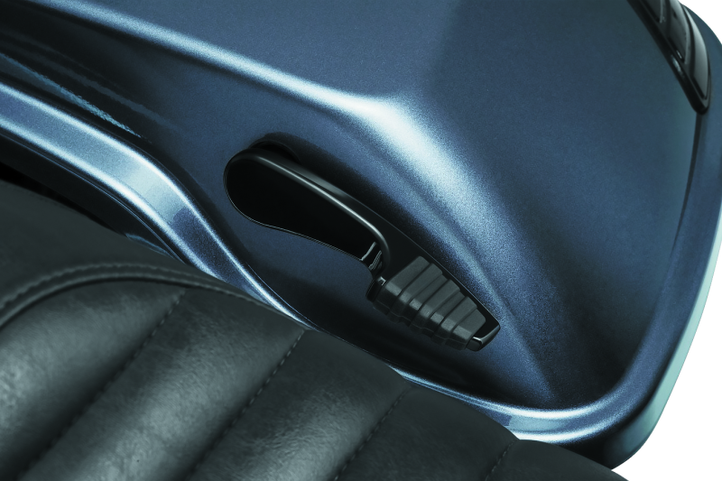 Kuryakyn Quick Draw Saddlebag Latch Handle in black for Harley-Davidson touring models, shown on motorcycle saddlebag.