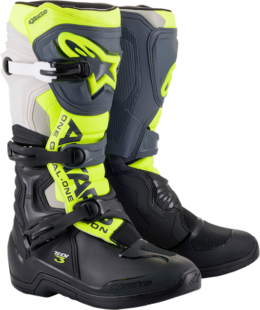 Alpinestars Tech 3 motorcycle boots in black, gray, and yellow fluorescent showing sturdy design and protective features.