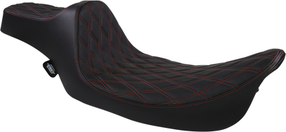 Black Drag Specialties Predator III extended reach motorcycle seat with red stitching for Harley FL models 1999-2007.