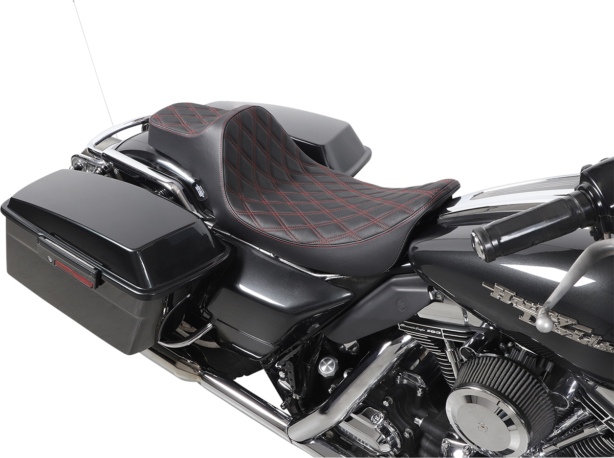 Black Drag Specialties Predator III extended reach motorcycle seat with red stitching for Harley FL models 1999-2007.