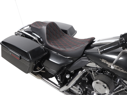 Black Drag Specialties Predator III extended reach motorcycle seat with red stitching for Harley FL models 1999-2007.