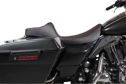 Black Drag Specialties Predator III extended reach seat for Harley FL models 1999-2007, with red stitching and contoured design.
