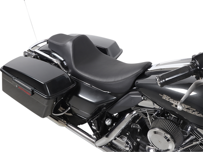 Black Drag Specialties Predator III extended reach motorcycle seat for Harley FL models 1999-2007 with smooth finish.