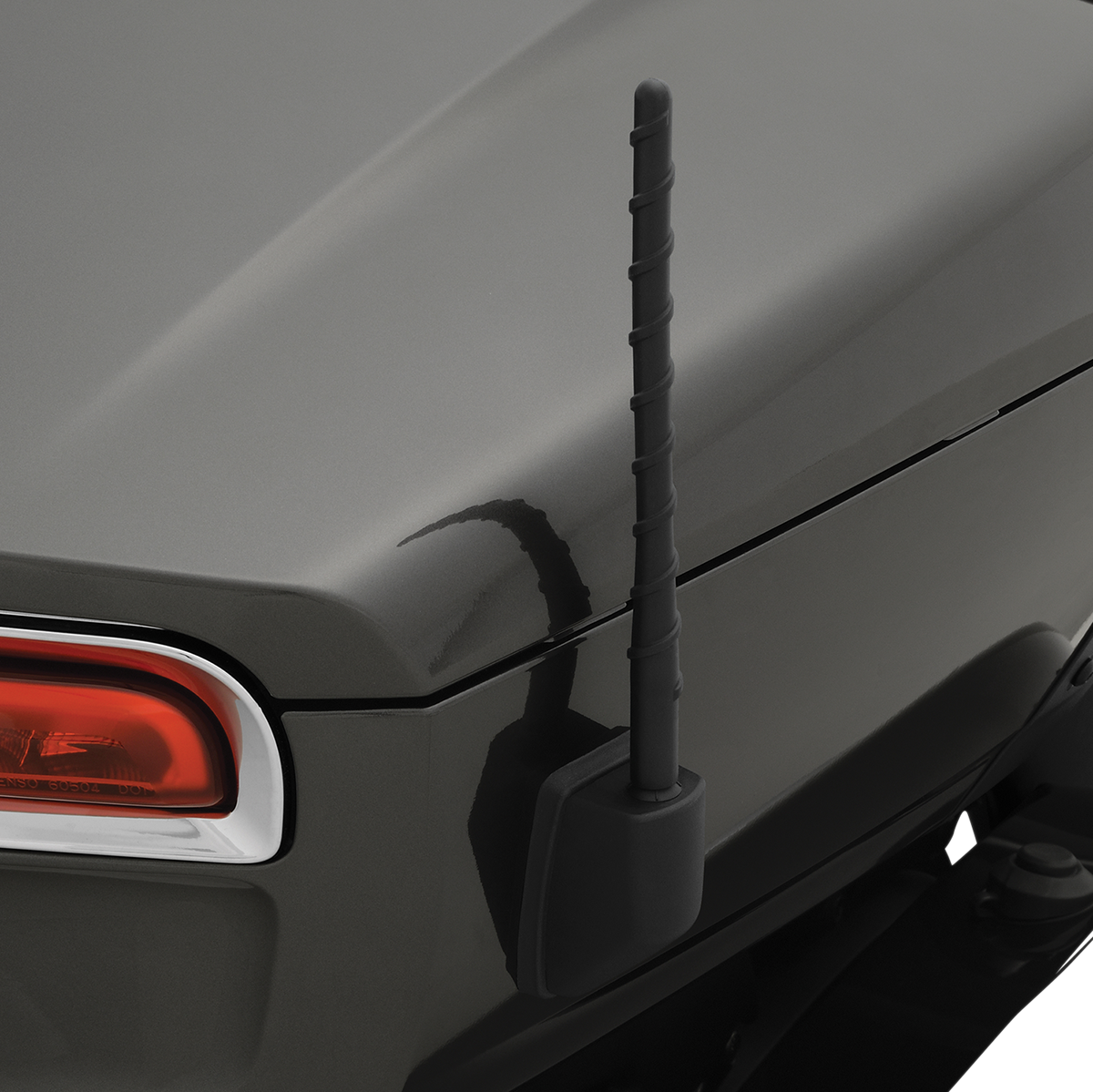Chrome spiral engine antenna for SHOW CHROME 41-180, featuring a shiny, coiled design mounted on an engine component by Bill's Exhausts.