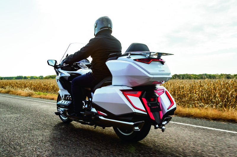 Kuryakyn Omni LED rear bag accents on Honda GL1800 Gold Wing motorcycle, showcasing sleek LED lighting and stylish design.