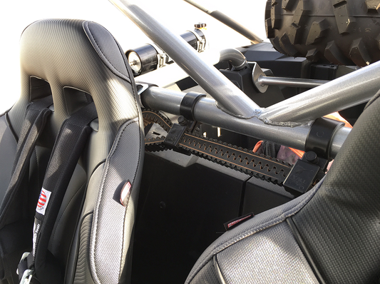 Moose Offroad UTV spare belt mount attached to a roll cage, universal frame carrier for off-road vehicles.