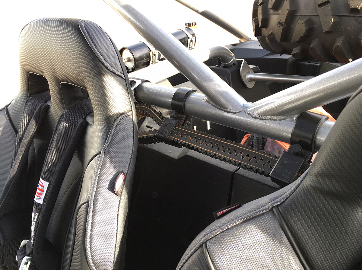 Moose Offroad UTV spare belt mount for 1-1/4 to 1-1/2 inch wide belts, universal fit, black metal bracket with mounting hardware.