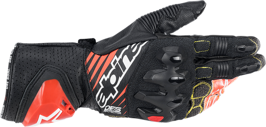 Alpinestars GP Tech v2 motorcycle gloves in black, white, and fluo red, medium size, with protective armor and breathable material.