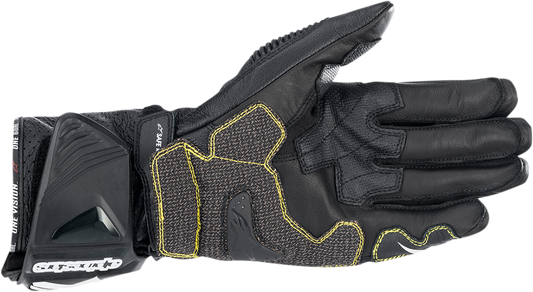 Alpinestars GP Tech v2 motorcycle gloves in black and white, size 2XL, featuring protective armor and breathable material.