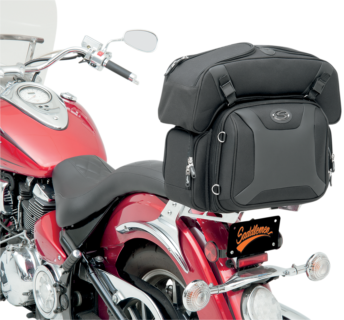Saddlemens FTB2500 Sport Sissy Bar with Combo Bag on motorcycle seat, featuring chrome finish and padded backrest.