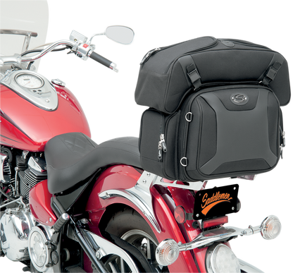 Saddlemens FTB2500 Sport Sissy Bar with Combo Bag on motorcycle seat, featuring chrome finish and padded backrest.
