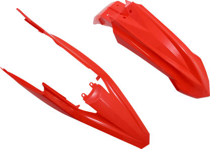 A red ACERBIS full replacement body kit for motorcycles, showcasing the sleek, aerodynamic design and vibrant color.