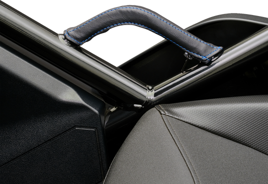 Blue stitched SHOW CHROME Grab Handle Cover for engine from Bill's Exhausts, shown on a motorcycle engine component.