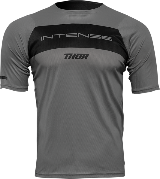 Gray and black THOR Intense Assist Dart short-sleeve cycling jersey with fit and style details.