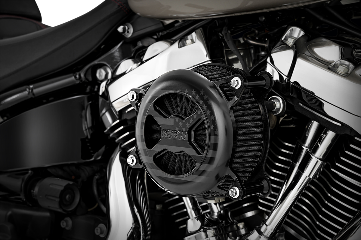 Vance & Hines VO2 America Air Cleaner in Freedom Black mounted on motorcycle engine for enhanced airflow and performance.
