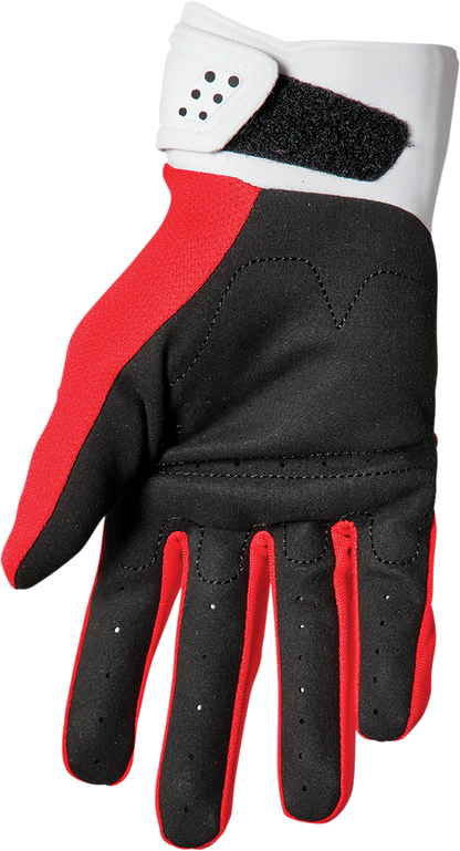 Red and white THOR Youth Spectrum Gloves in size XS, featuring durable construction and vibrant color design.