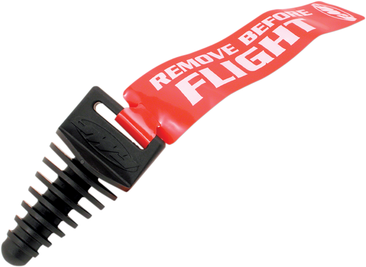 FMF Wash Plug with Streamer for motorcycle exhaust protection, showing the black protective plug and streamer detail.