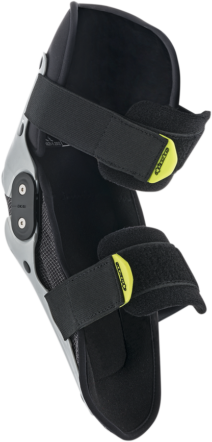 Alpinestars Youth SX-1 knee protectors in silver and yellow fluo, size S/M, designed for motocross and dirt bike protective gear.