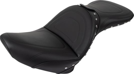 Bill's Exhausts SADDLEMEN Explorer Special Studded Seat with backrest for Softail motorcycles, featuring a sleek, padded design.